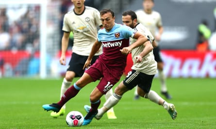 Mark Noble gets away from Manchester United’s Juan Mata - his influence compared to that of the Spaniard was noticeable on Sunday.