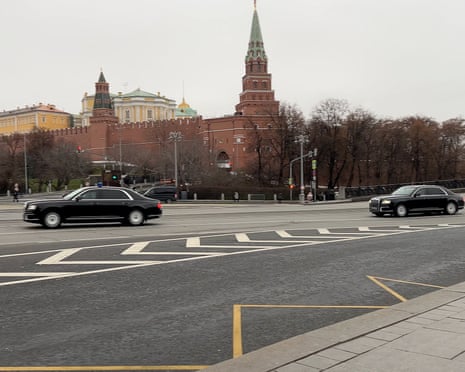 A motorcade, reportedly transporting officials including US president Donald Trump's envoy Steve Witkoff and son-in-law Jared Kushner, drives along a road past the Kremlin before a scheduled meeting with a Russian delegation in Moscow, Russia.