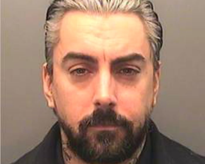 Two men charged with prison murder of Lostprophets singer Ian Watkins