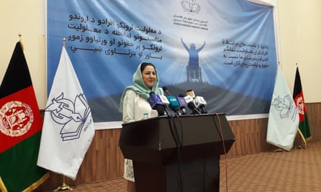 Blind Afghan human-rights activist Benafsha Yaqoobi speaking at a lectern