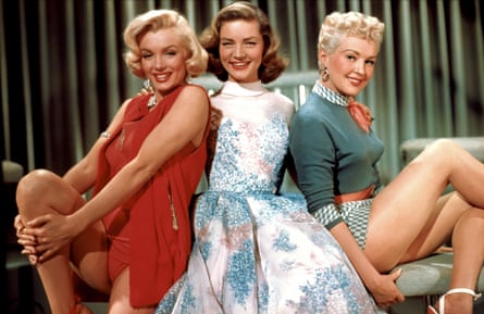 Monroe (left) with Lauren Bacall and Betty Grable in How to Marry a Millionaire.