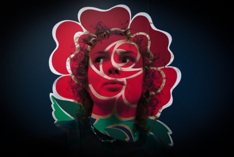 A portrait of England’s Ellie Kildunne against a background of the red rose emblem before a Six Nations match between England and France.