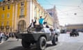 Old military vehicles arrive for a ceremony marking the 50th anniversary of the Carnation Revolution in Lisbon, Portugal, 25 April 2024