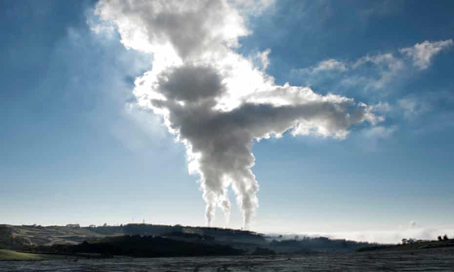 Steam billowing from a coal-fired power plant