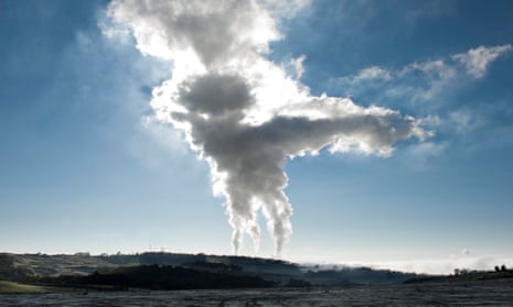 Steam billowing from a coal-fired power plant