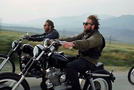 Two Hells Angels riding motorcycles in Bakersfield, California, USA.
