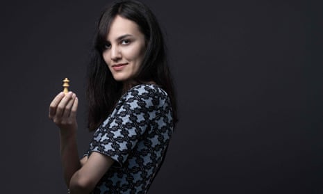 Meet the world's sexiest chess player who loves dressing up in