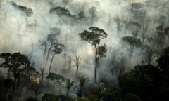 Smoke billows during a fire in an area of the Amazon rainforest near Porto Velho, Rondonia state, Brazil
