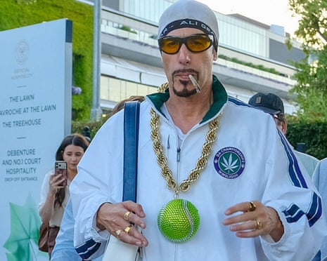 Sacha Baron Cohen dressed as Ali G departs the Wimbledon tennis tournament where he attended the men’s singles final earlier this month.