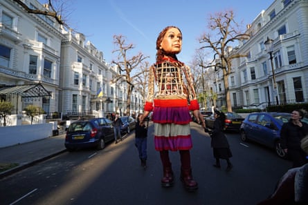 Little Amal outside the Ukrainian Embassy in London, 2022.