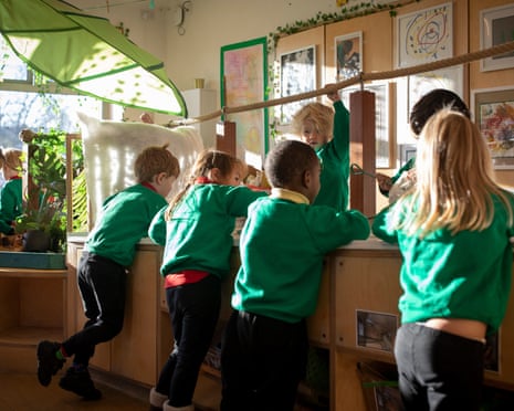Children play in the art room at College Green nursery school