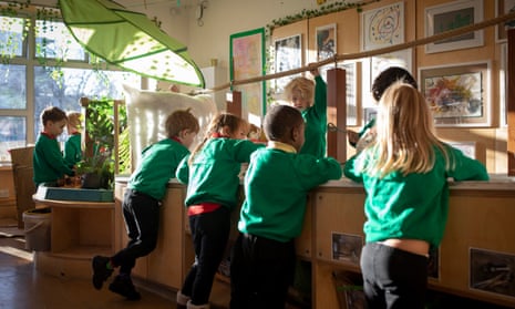 Children play in the art room at College Green nursery school