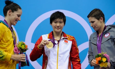 Ye Shiwen of China shows her gold from the 200m individual medley