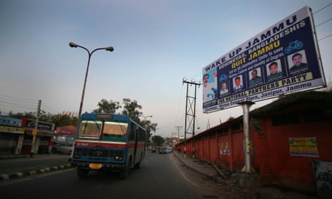 A roadside billboard in Jammu warns refugees to leave the north Indian city