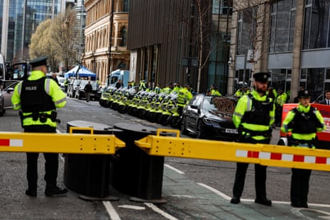 Police officers on duty outside the Grand Central Hotel in Belfast, where Joe Biden is staying.