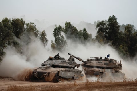 tanks move along a road