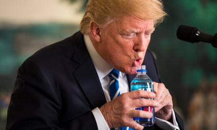 Trump takes an awkward sip of water during his speech.