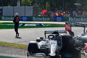 Max Verstappen walks walks away from the crash