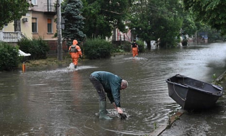 A 60 year-old man in the partially flooded town of Kherson