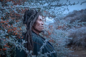 People category winner: Miss by Yanrong Guo This work was taken in the Daliang mountains, located in Liangshan Yi Autonomous Prefecture, the largest settlement of Yi people in China. The mountains are at the junction of the Sichuan and Yunnan provinces and they cover more than 60,000 sq km, with a total population of 4,730,400. There are more than 10 ethnic groups such as the Han, Yi, Tibetan, Mongolian and Naxi living in the territory. Young people in the mountains move out of the province to work, leaving the elderly and children at home. The man in the picture is missing his relatives