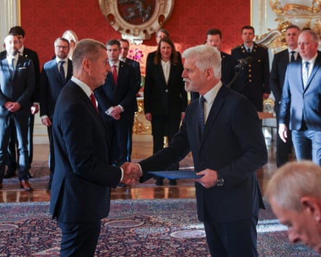 Czech President Petr Pavel shakes hands with the ANO party leader Andrej Babiš as he is appointed as the country’s new prime minister at Prague Castle in Prague, Czech Republic.
