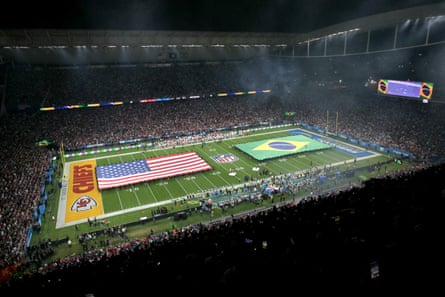 US and Brazilian flags at an NFL game in Brazil in 2025.