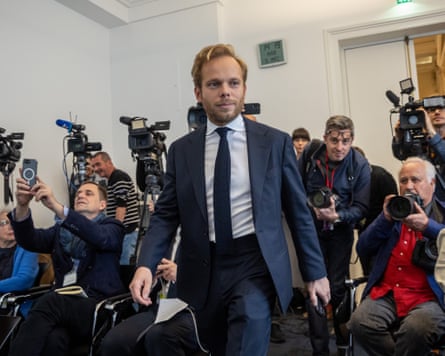 Charles Alloncle is photographed as he arrives for a news conference