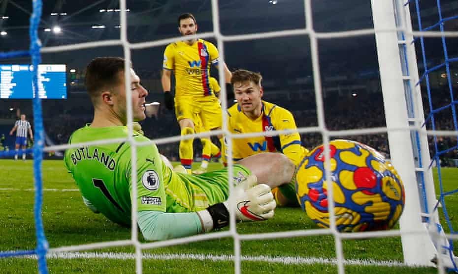 Crystal Palace's Joachim Andersen (right) watches on as his deflection beats Jack Butland for the Brighton equaliser.