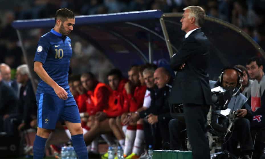 Karim Benzema, left, walks past Didier Deschamps during France’s match against Georgia in Tbilisi in September 2013.