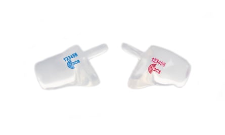 A pair of white ACS SleepSound earplugs, one with red numbers printed on it, the other with blue