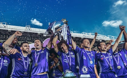 Davis Luiz gets front and centre as Chelsea lift the Premier League trophy in 2017.