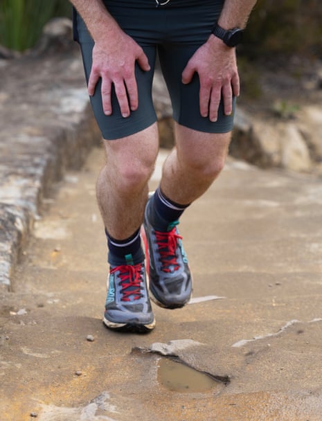 A picture of a runners legs as they start to feel the burn on a long run
