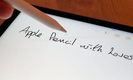 The Apple Pencil features an on-screen cursor display.