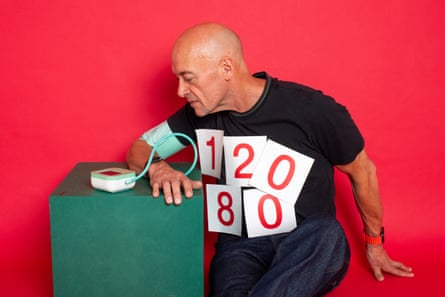 Phil Daoust taking his blood pressure.