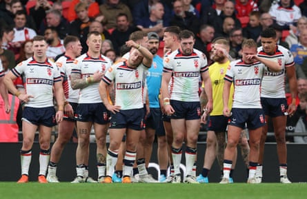 England players look disconsolate after Australia’s third try.