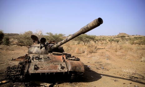 A destroyed tank is seen in a field in the aftermath of fighting between the Ethiopian army and the Tigray People's Liberation Front (TPLF)