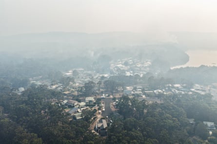 Smoke blankets the town of Nerong