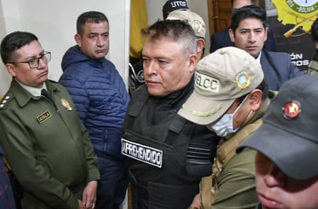 General Juan José Zúñiga Macías is escorted by police on Wednesday after a coup attempt in Bolivia