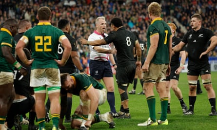 Wayne Barnes talks to the New Zealand stand-in captain, Ardie Savea