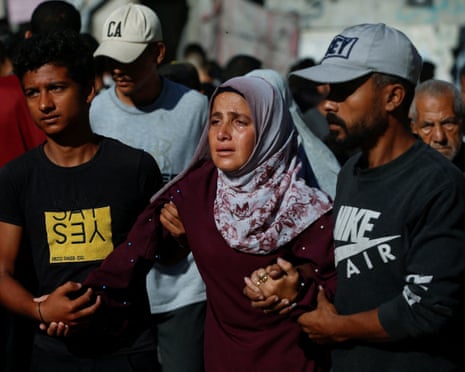 Mourners attend the funeral of Palestinians killed on Wednesday in what the Gaza Health Ministry described as an Israeli airstrike on a house, at Al-Shifa Hospital in Gaza City, June 26, 2025.