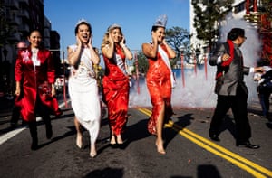 Los Angeles, US: Participants in a beauty contest set off firecrackers during the 124th annual Golden Dragon lunar new year parade