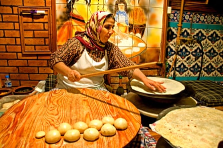 Woman baking bread in Istanbul’s Grand Bazaar.