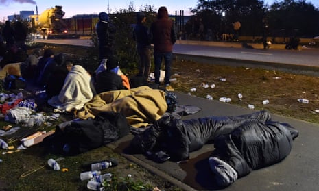 Refugees sleep in the open near Calais