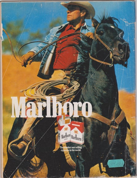 1992 ad for Marlboro cigarettes, showing a cowboy on a horse and two packs of cigarettes
