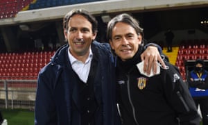 Lazio manager Simone Inzaghi greets his brother Filippo before kick-off.