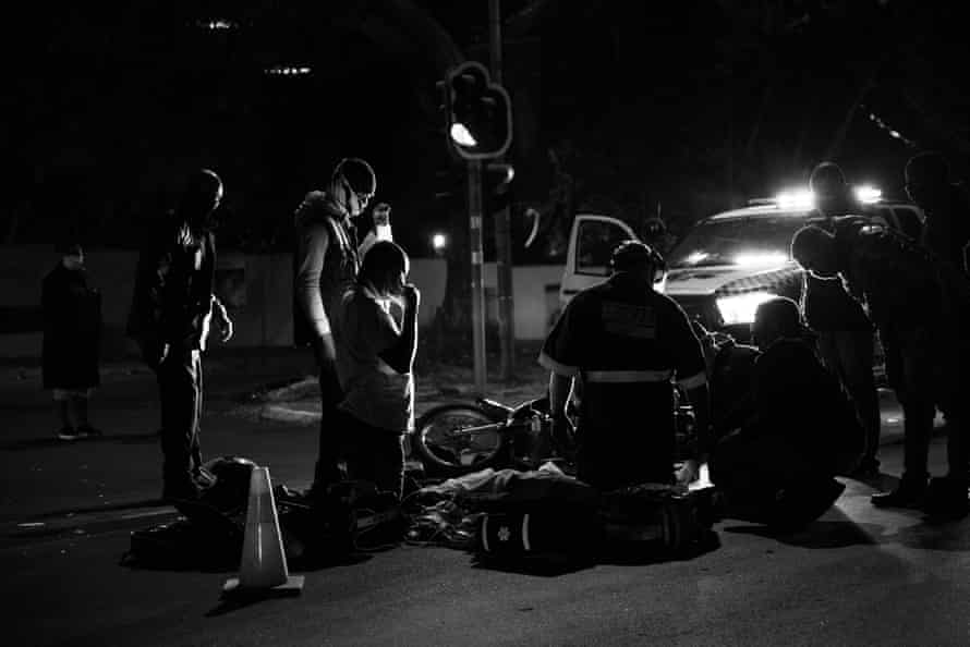 Ghost riders: the invisible lives of Johannesburg food couriers – photo essay | South Africa 1 The scene of a crash in Sandton