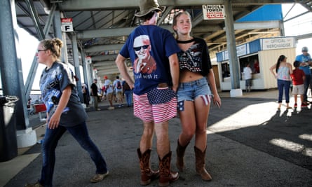 Race fans in US flag-themed shorts and a Donald Trump T-shirt attend Nascar’s Alabama 500 in Lincoln, Alabama.