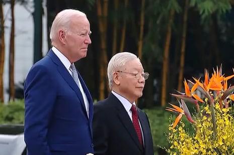 President Joe Biden attends a welcoming ceremony hosted by Vietnam's Communist party general secretary Nguyen Phu Trong at the Presidential Palace of Vietnam in Hanoi on Sunday.