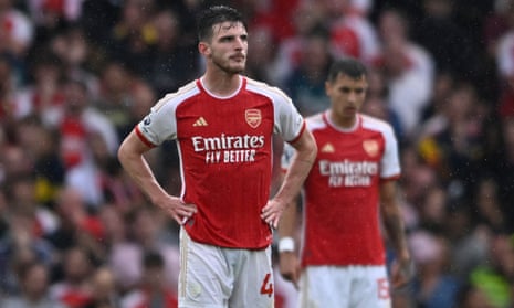 Arsenal's Declan Rice reacts after Fulham's Joao Palhinha scores their second goal.
