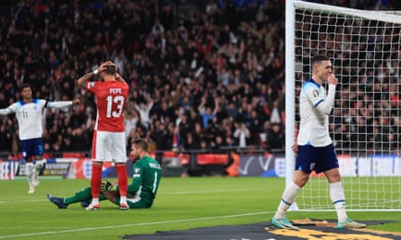 Enrico Pepe and Phil Foden react to the former’s own goal.